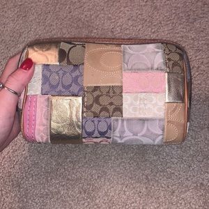 Used coach patchwork cosmetic case.